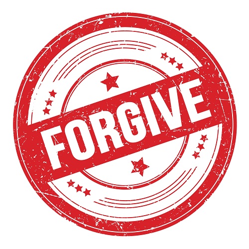 FORGIVE text on red round grungy texture stamp.